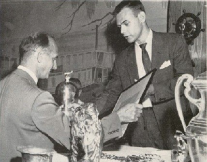 Michael Stroukoff, Jr (right) presents the Larissa Stroukoff Award and trophy to Steve Bennis for the best goal-and-return flight during the 22nd National Competition.  Photo Rice Studio